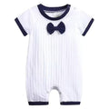 White textured baby boy romper with navy trim and bow tie